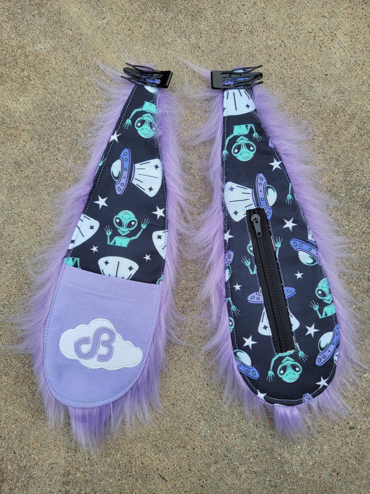 Clip - On Bunny Ears 23 - Nothing is as it Seams
alien spaceship print, lavender corduroy, daily bread cloud patch, lavender faux fur, pockets on each ear.