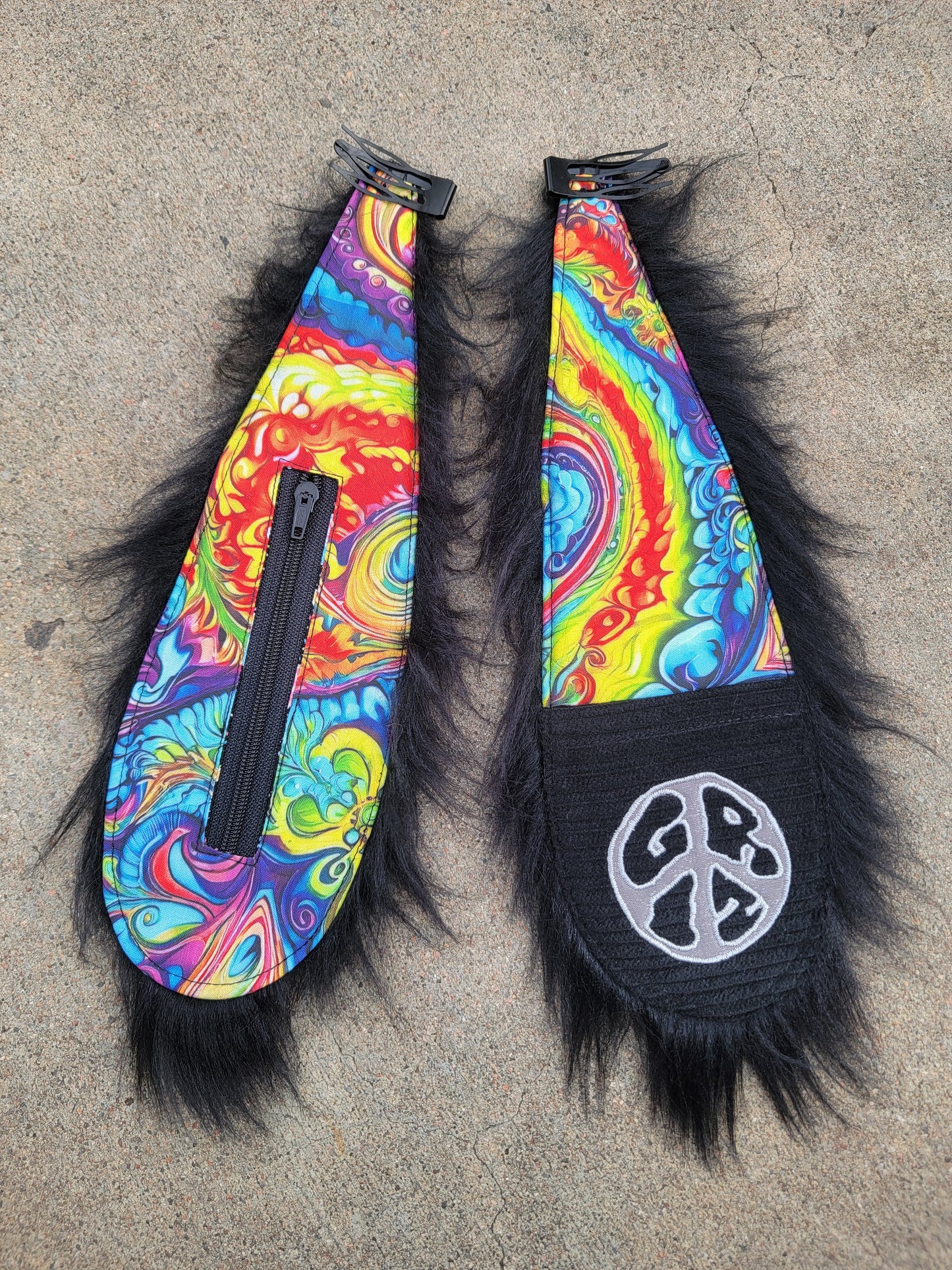 Clip - On Bunny Ears 30 - Nothing is as it Seams
one-of-a-kind clip-on bunny ears for hats or hair, featuring a rainbow print a GRIZ patch