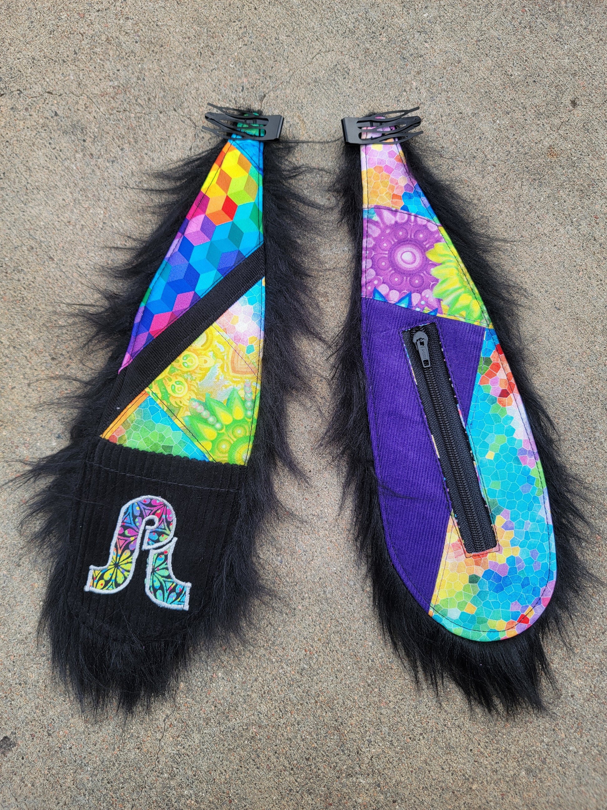 Clip - On Bunny Ears 29 - Nothing is as it Seams
handmade patchwork clip-on bunny ears. rainbow prints with a pretty lights patch on the pocket. zipper pocket on the other ear.sewn onto heavy duty hair clips